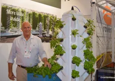 Laurens Trebes of Urban Ponics with vertical cultivation towers in the booth at Rovero.